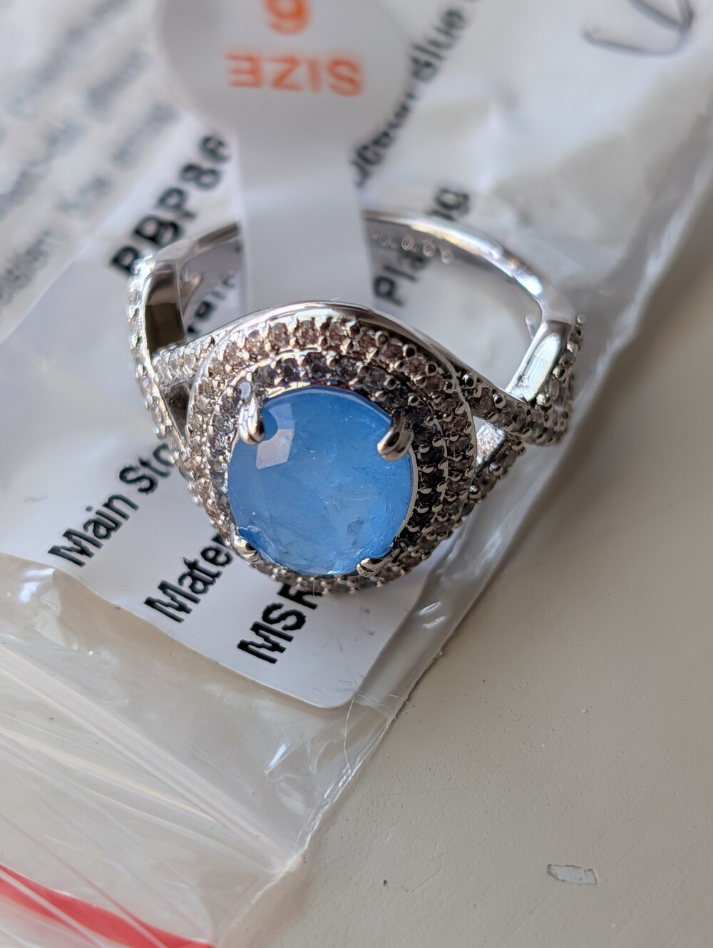 "Walking on Air" Bomb Party Ocean Blue Quartz on Rhodium Plating - Size 6